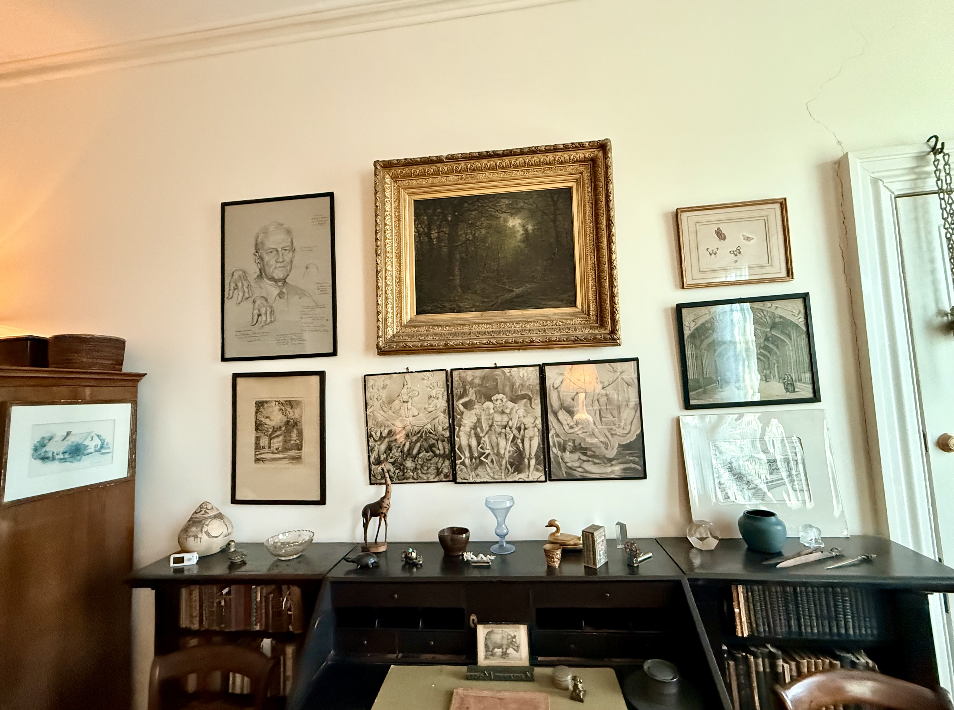 Moore's writing desk and gallery wall